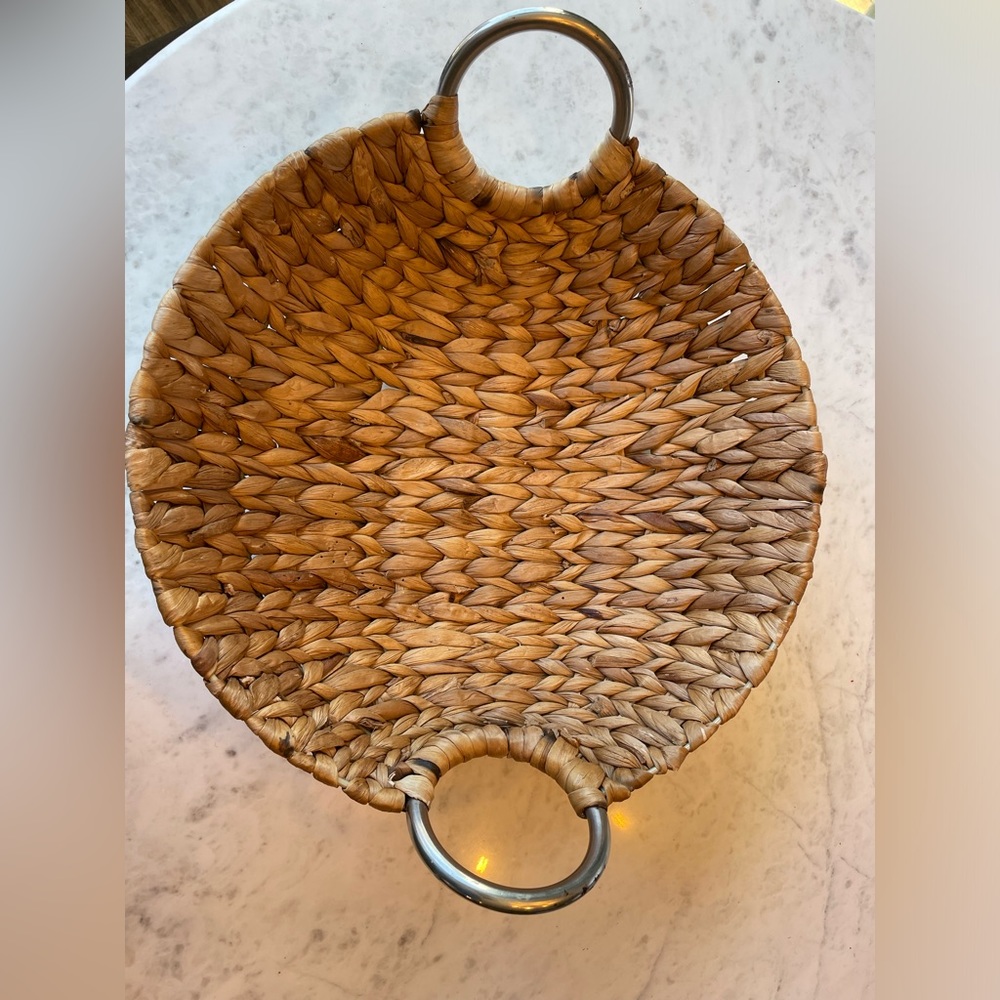Beautiful woven basket, a little over 13 inch diameter. Silver handles